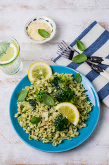Traditional pasta tripoline with pesto
