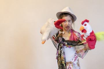Happy child, creative fun concept - girl playing in the theater
