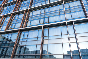 Obraz premium close up of modren glass building