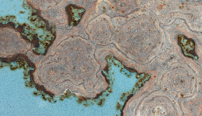 Obraz na płótnie Canvas Old blue paint and surface texture of rust