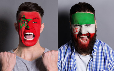 Emotional soccer fans with painted flags on faces