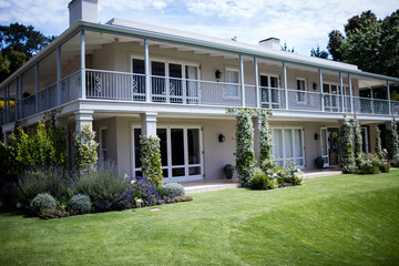 Fototapeta na wymiar Exterior of a house with lawn