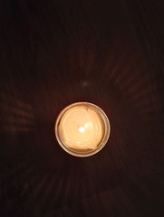 Direct shadow around candle