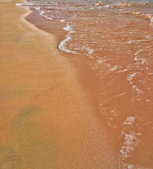 Coast. Waves and sand.