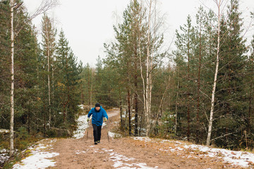 Obraz premium A man walks along a path