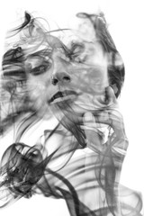 Paintography. Double Exposure portrait of a seductive ethnic woman's profile combined with hand drawn ink painting created using unique technique. black and white