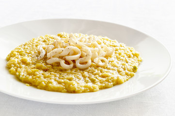 risotto with leek and saffron toppled with calamari