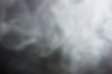 Background white thick smoke on black
