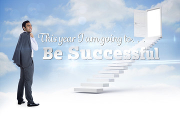 Smiling businessman standing against steps leading to open door in the sky