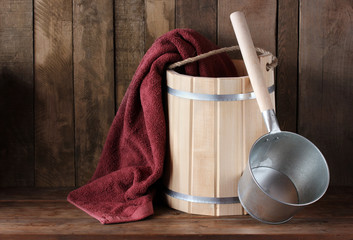 Bath accessories: wooden bucket and ladle.