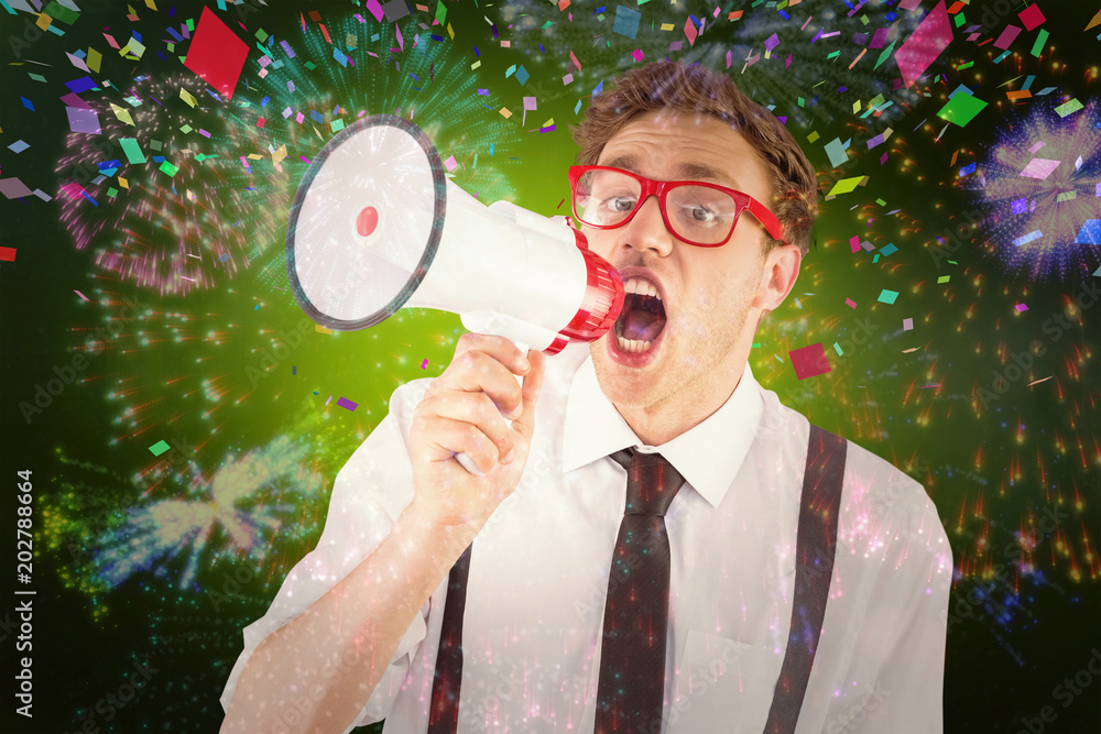 Poster Geeky businessman shouting through megaphone against colourful fireworks exploding on black background