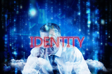 The word identity and focused businessman with magnifying glasses against lines of blue blurred letters falling