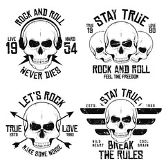 Rock and roll t-shirt graphic design with skulls, wings, arrows and headphones. Rock music slogan for t-shirt print and poster. Vintage skulls with grunge texture