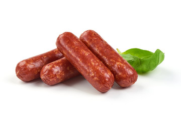 Salami smoked sausages with herbs isolated on white background