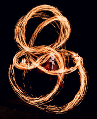 Fire show. Fire performance at the night.