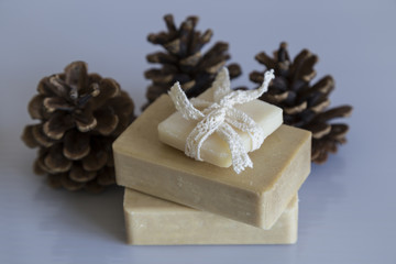 gift olive soaps with cones on the white background for concept.