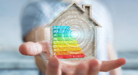 Businessman using 3D rendering energy rating chart in a wooden house