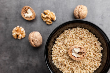 Delicious walnuts on rustic background