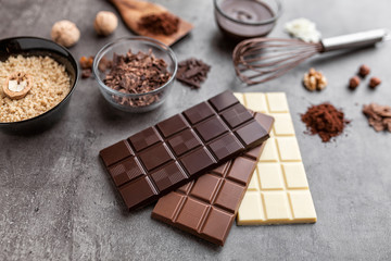 Delicious variety of chocole on rustic background
