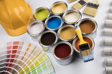 Can with paint and paintbrush