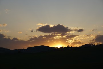 Sunset on meadow with hills and tree. Slovakia