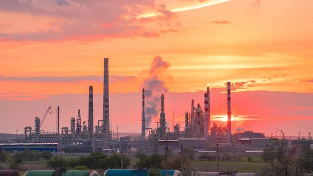 Oil Industry Refinery factory at Sunset time. Timelapse 4K