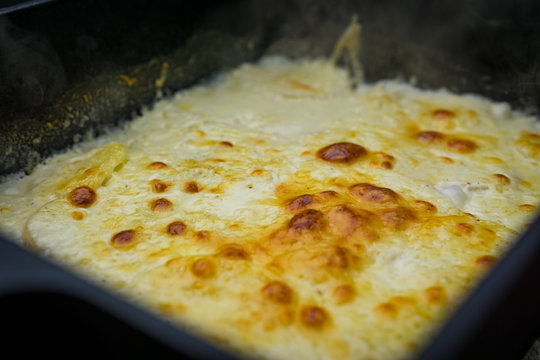 Potato casserole with cheese from the dutch oven