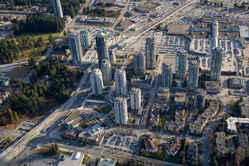Coquitlam, Greater Vancouver, British Columbia, Canada - March 9, 2018: Aerial view of Residential Buildings and Shopping Mall.