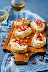 Pomegranate Brie balsamic crostini