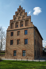 Facade of a historic, Gothic tenement house in Poznań.