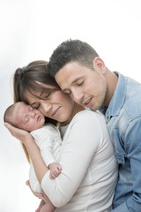 Fototapeta premium Young Couple Posing Happy with their first child