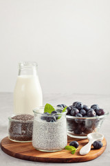 Chia pudding with fresh berries and almond milk. Superfood concept. Vegan, vegetarian and healthy eating diet with organic products