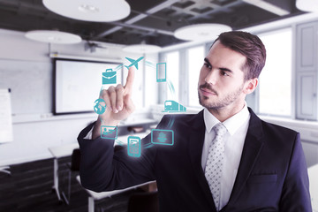 Thoughtful businessman pointing something with his finger against classroom