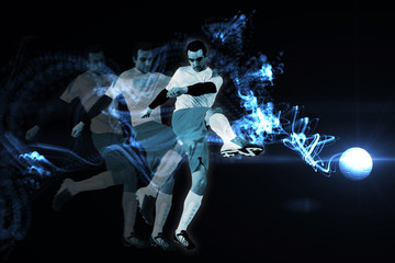 Obraz na płótnie Canvas Football player in white kicking against abstract glowing black background