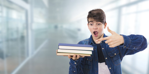 student portrait with books and expression
