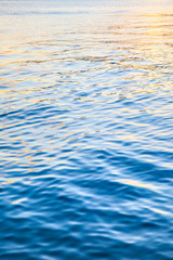 Colorful water surface at sundown