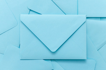 scattered blue mail envelopes background