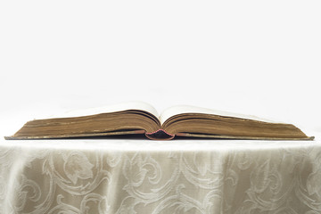 Opened ancient old book with copy space