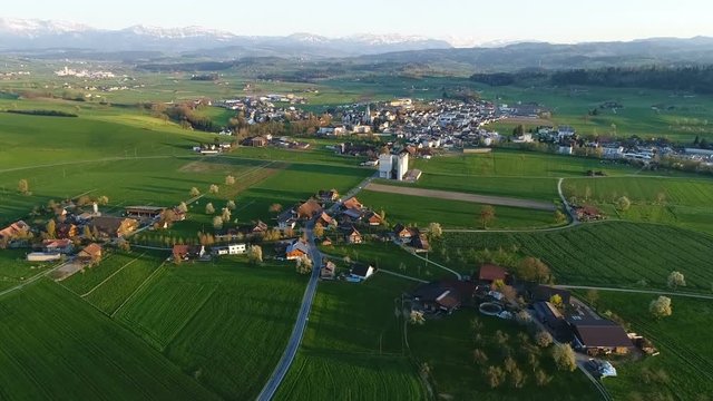 Aerial view of the small village Grosswangen near Lucerne in central Switzerland in the evening light