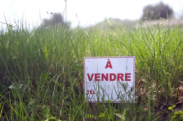 sign indicating that land is for sale
