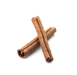 Aromatic cinnamon sticks on white background
