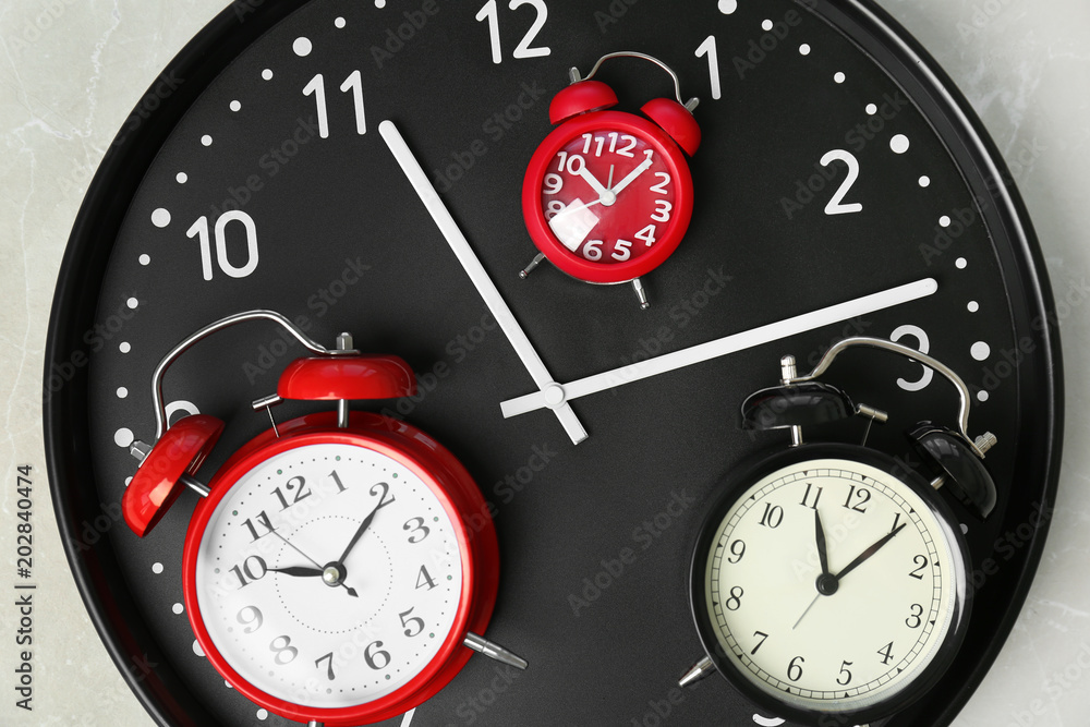 Poster many different clocks, top view. time change concept