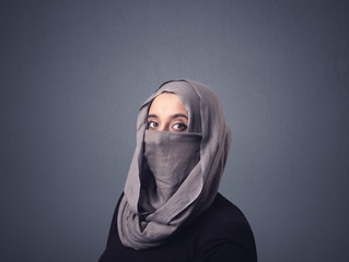 Young muslim woman wearing niqab 