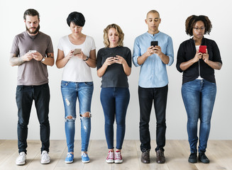 Obraz premium Group of people using mobile phone