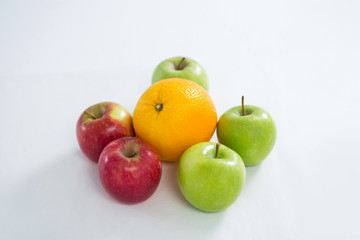Close-up of oranges, red apples and green apples