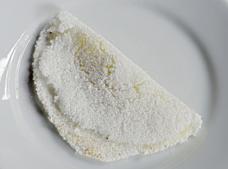 Fototapeta na wymiar Beiju of tapioca on white plate