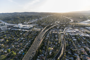 Late afternoon aerial view of Ventura 101 Freeway in the San Fernando Valley area of Los Angeles,...