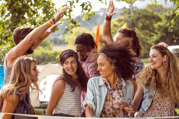 Happy hipsters dancing to the music