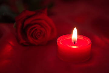 Obraz na płótnie Canvas Candle with red rose