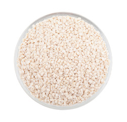 Urad Dal or Black Gram Split Pulse Unpolished Without Cover Also Know as Vigna Mungo, Black Gram, Urad Bean, Mungo Bean, Black Matpe Bean or Split Black Gram isolated on White Background